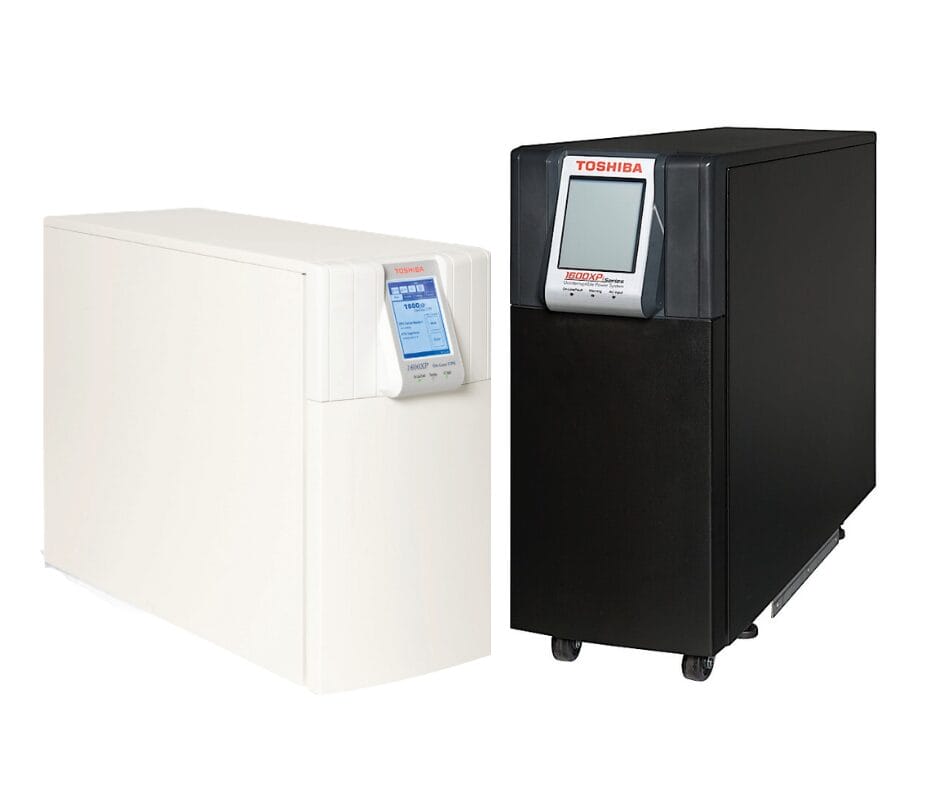 Two Toshiba medical imaging devices, one white and one black, with digital displays on the front.